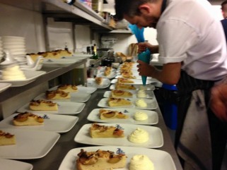 our chef preparing the peach & frangipane tarts.